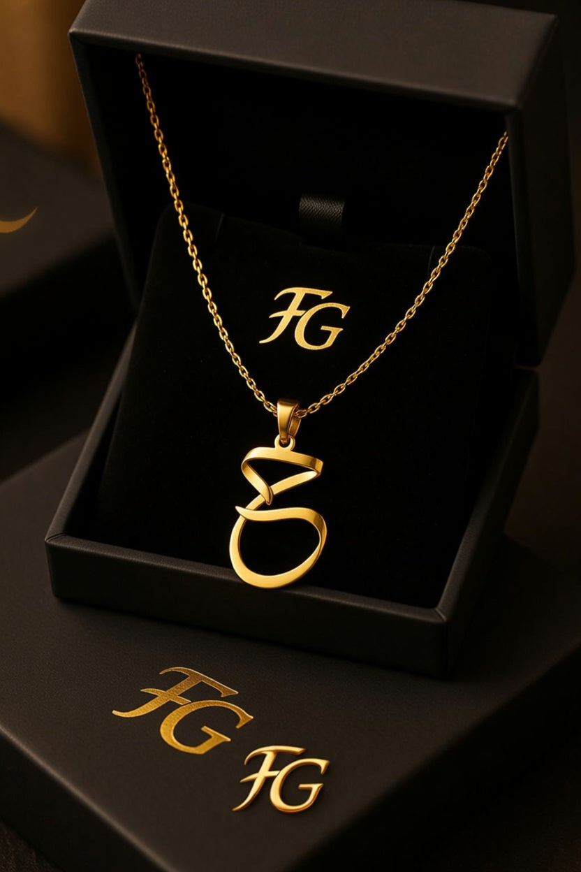 A necklace with a unique, modern Arabic letter pendant.